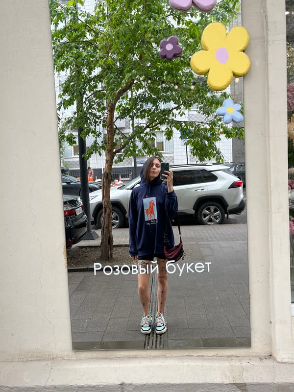 Morning street life captured across Krasnoyarsk during rainy June morning