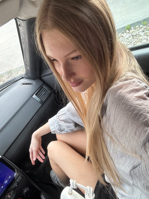 Afternoon in a parked car, Perm, with a strawberry drink