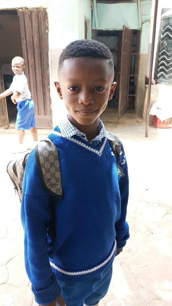School children gather in courtyard, Sabon Tasha, Nigeria