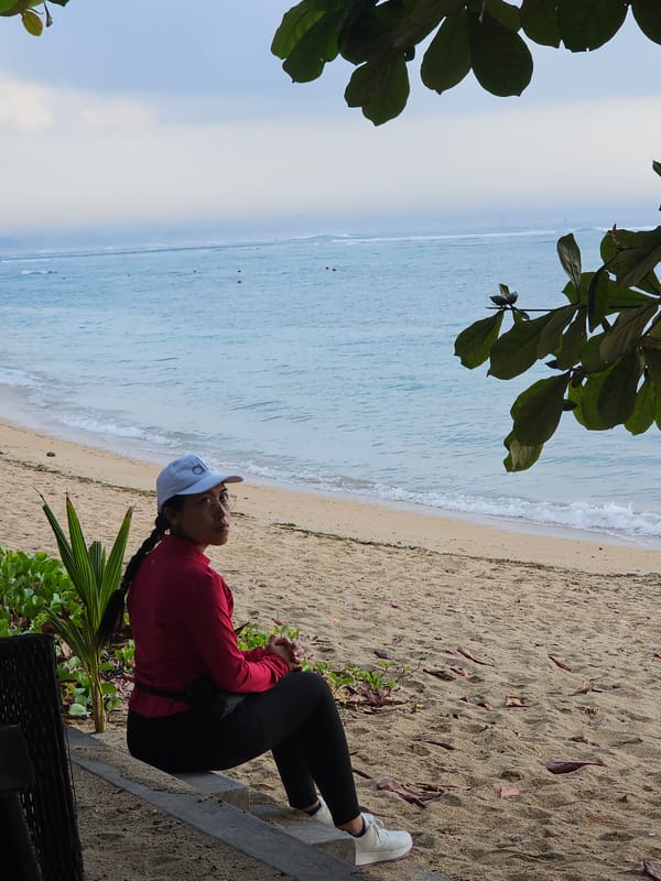 Cyclists and walkers share a breezy Denpasar beachside promenade