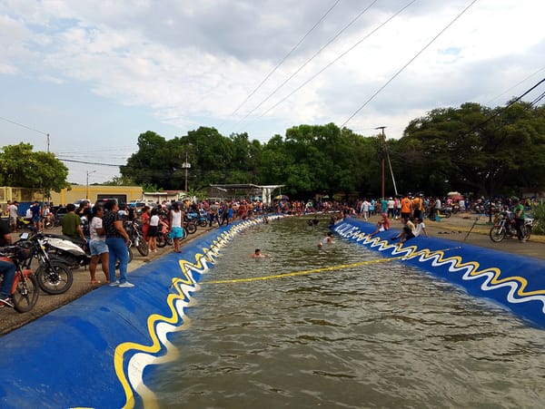 Crowds gather at decorated swimming facility in San Carlos