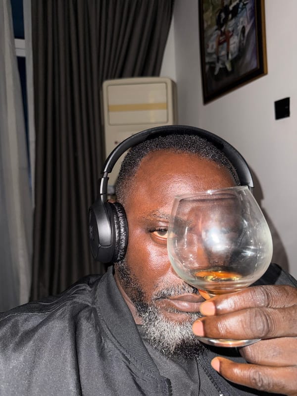 Headphones on, brandy in hand, chilling in Igboefon