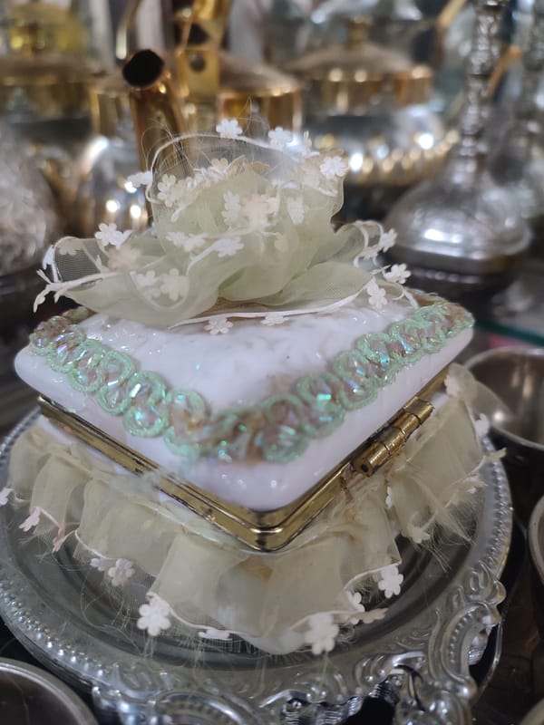 Ornate ceremonial gifts and décor at a Blang Cut event