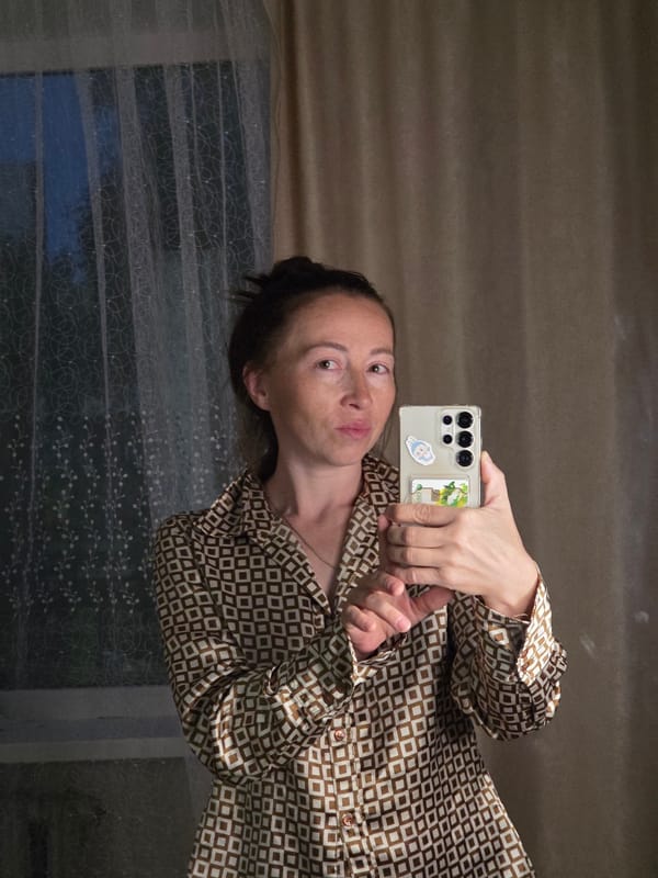 Evening in: satin sheets, an art book, and selfies