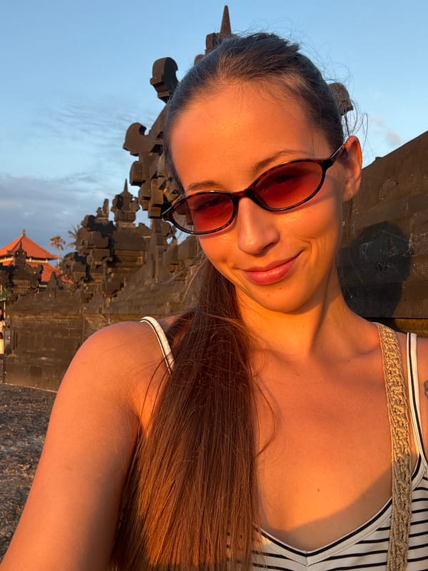 Tourists capture sunset moments at Mengwi temples and coastline