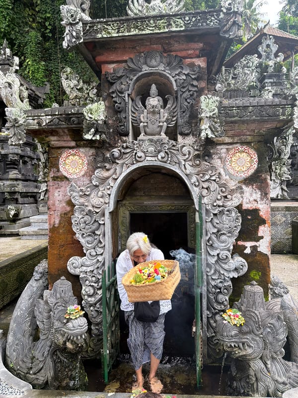 Religious ceremonies and tourism observed at Bali water temples