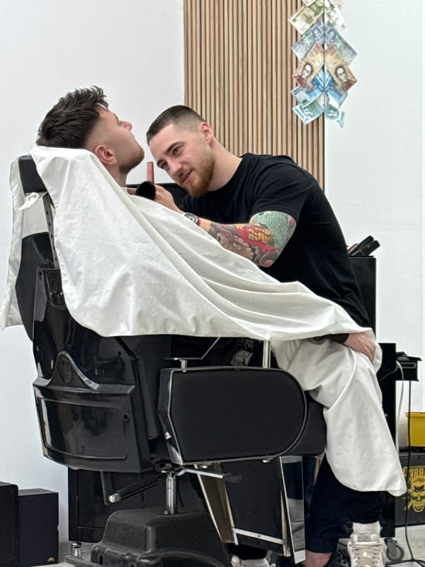 Barber provides haircut and shave services in Sofia