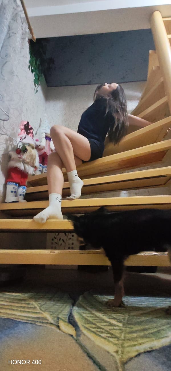 Woman documented in casual moments around Noviy building