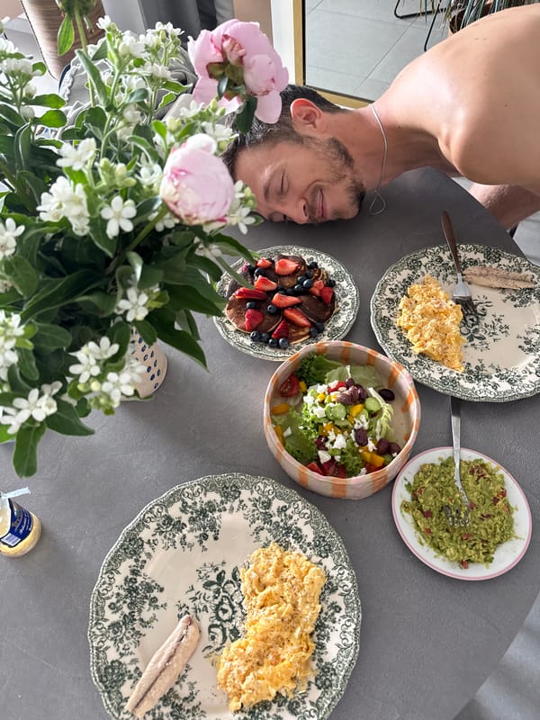 Breakfast scene captured with upside-down man in Tel Aviv