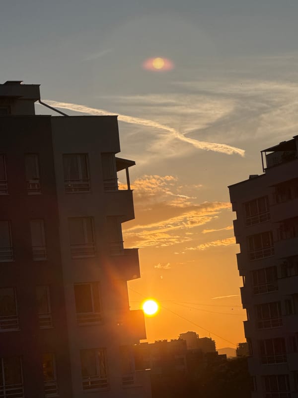 Sofia balcony evening: sunset, whisky, football, and small moments