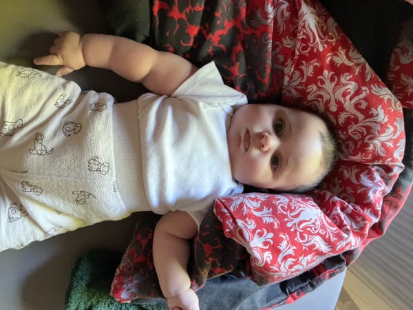 Baby photographed on colorful blankets in Frankfurt morning