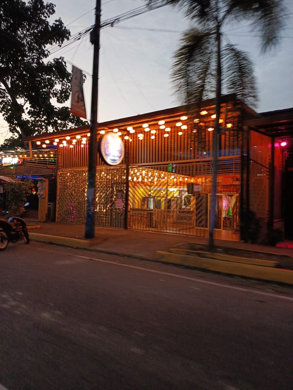 Restaurant exterior documented in Quevedo, Ecuador evening hours