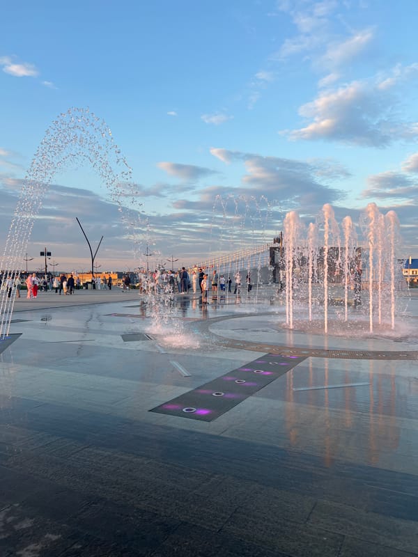 Summer evening at Magnitogorsk's fountain plaza