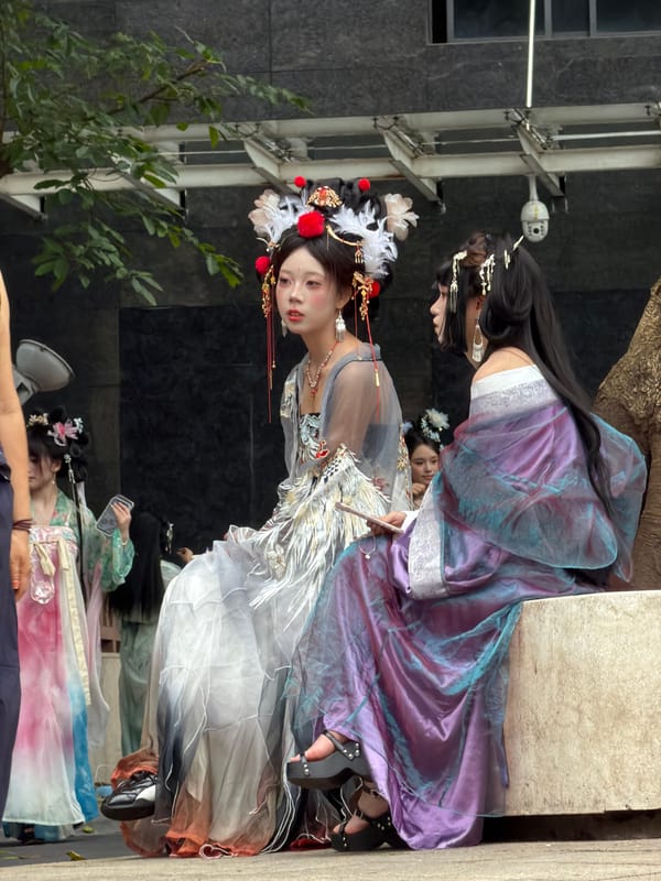 Hanfu photoshoot at a Chongqing temple amid city skyline