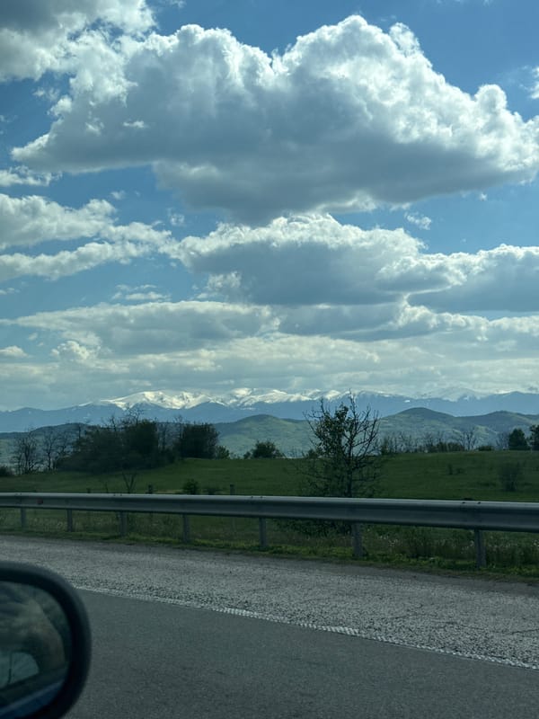 Motorist captures mountain scenery while driving near Ihtiman, Bulgaria