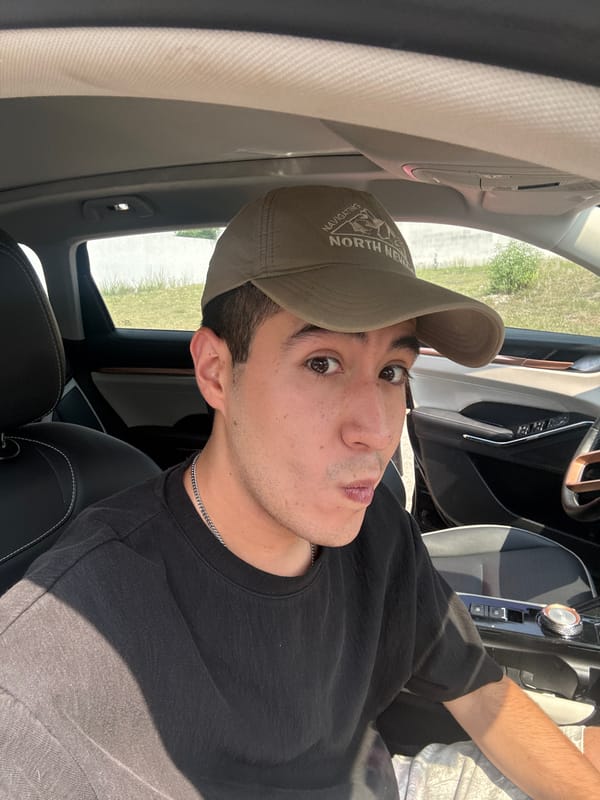 Young man takes selfies in car in Mexico