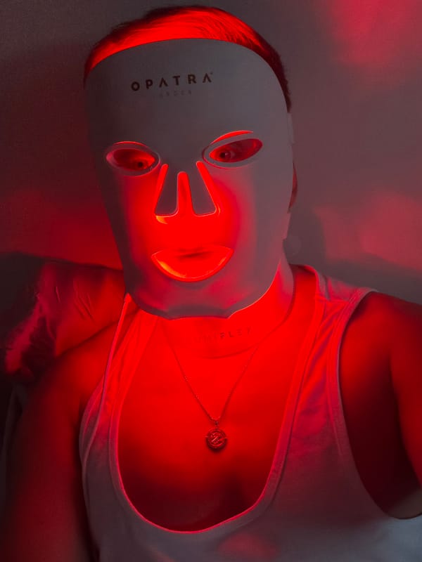 Person relaxes with face mask during skincare routine in London