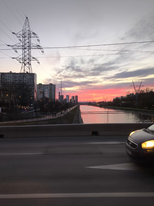 Traffic observed from moving vehicle on Moscow canal bridge