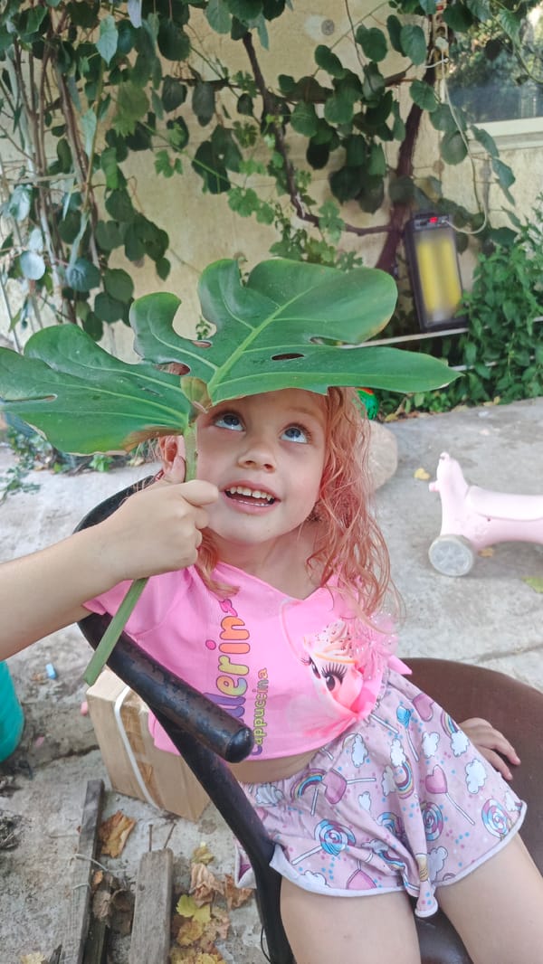 Laid-back afternoon outdoors, leaves and laughter in a green space