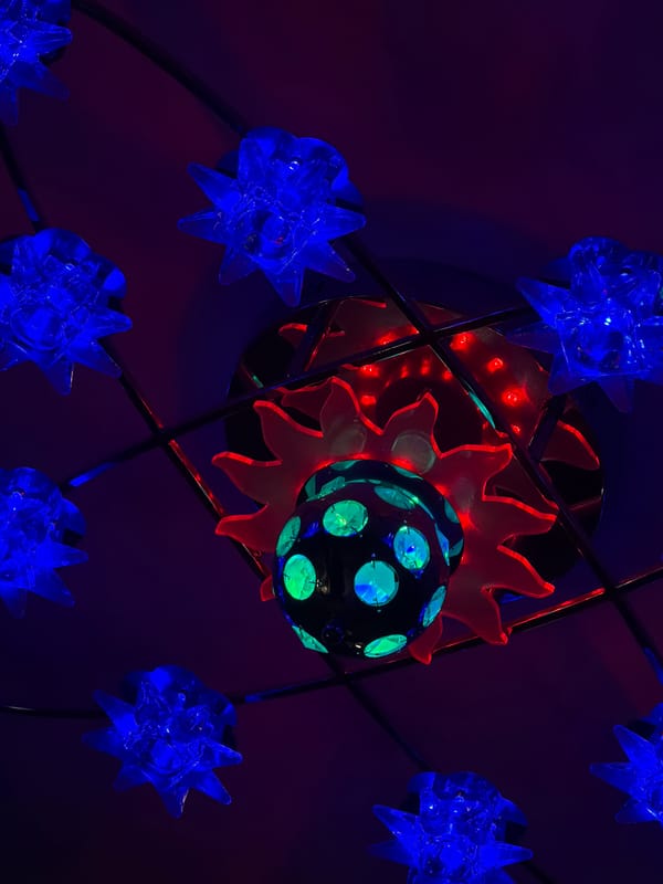 Blue star-shaped decorative lights observed in Perm indoor display