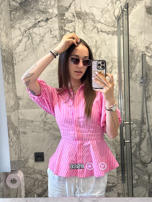 Woman takes mirror selfies in Shumen bathroom