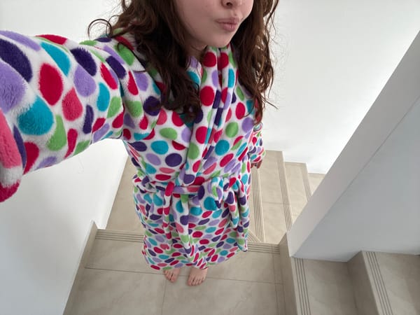 Woman takes selfies at home in Santa Clara Ocoyucan