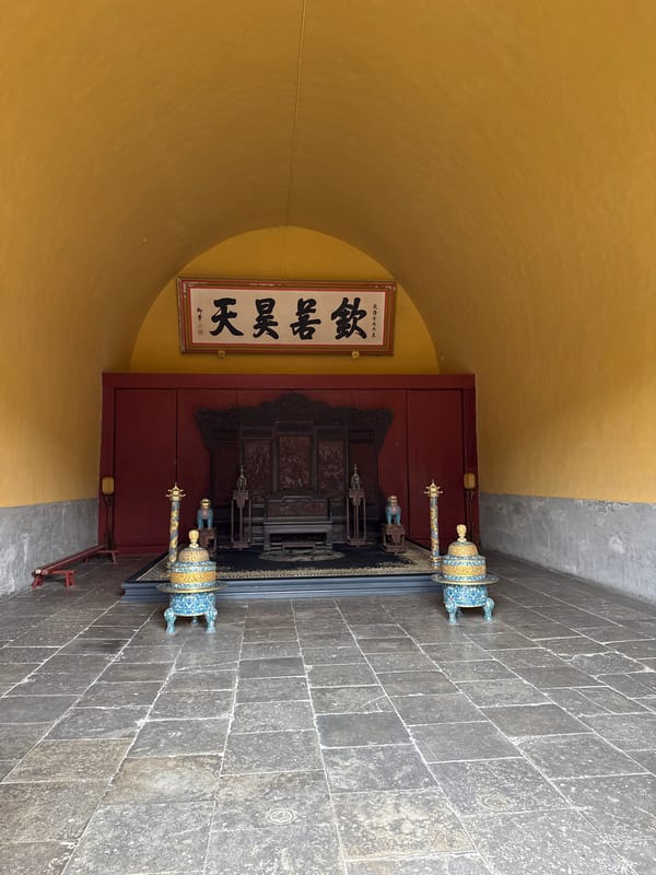 Visitors explore Temple of Heaven complex under overcast skies