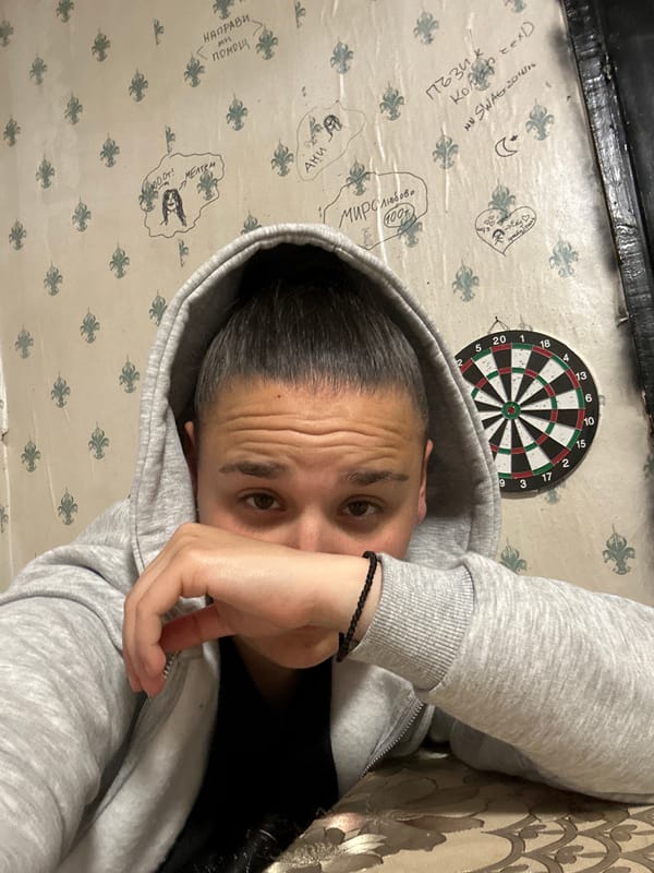 Person in grey hoodie photographed indoors in Plovdiv
