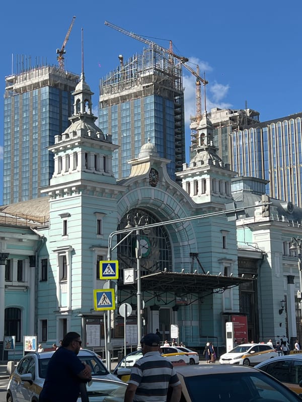 Daily life continues around Moscow's tourist landmarks and construction