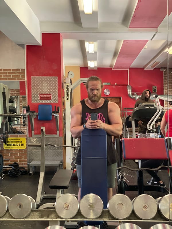 Inside a Saint Petersburg gym, Cyrillic signage on the walls.