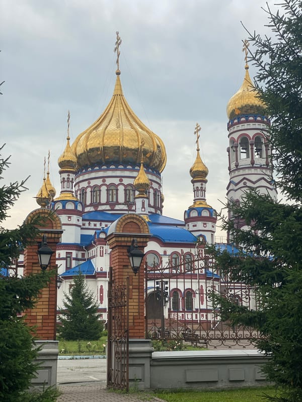 Novokuznetsk's Transfiguration Cathedral and its grounds on a grey morning