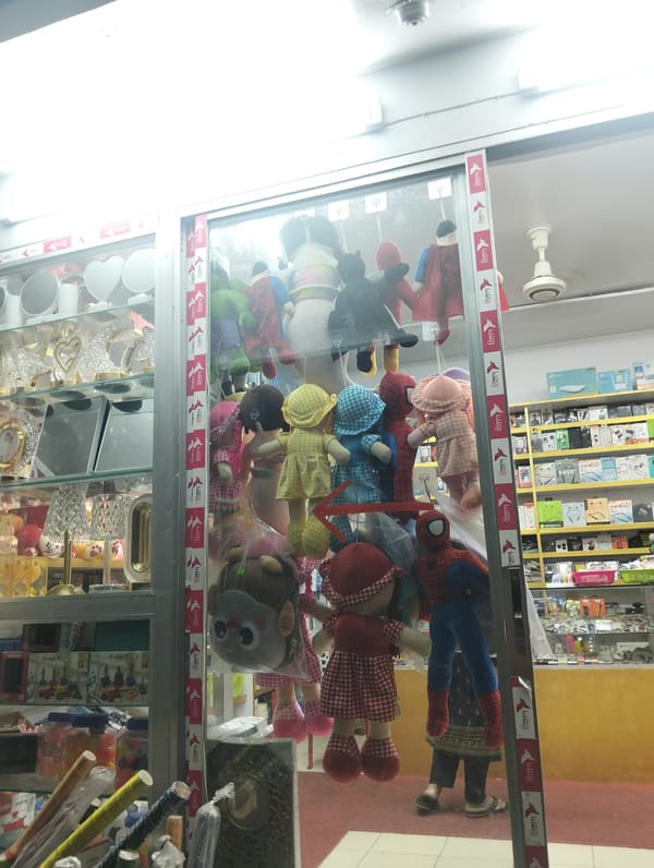 Street scenes and storefront activity captured in Dhaka