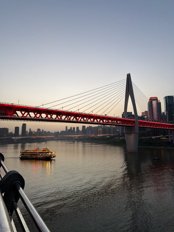 Twilight bridge scenes documented in Chongqing's Yuzhong District
