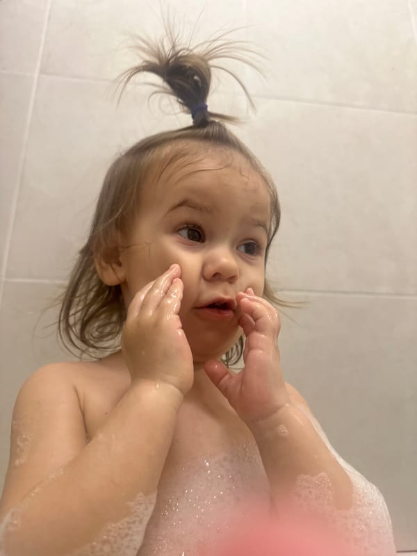 Child enjoys bubble bath in Kharnavy home