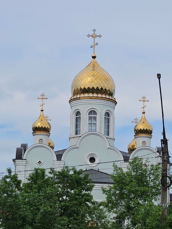 Orthodox church with golden domes observed in Rodniki, Russia