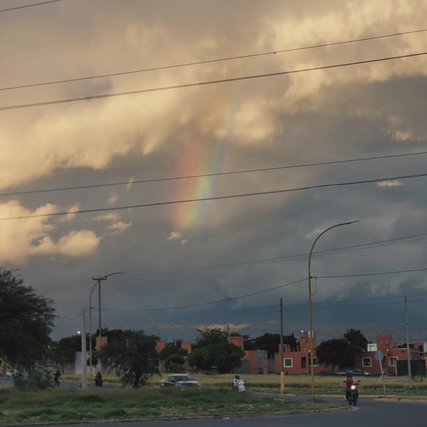 Rainbow appears over Catamarca, Argentina cityscape