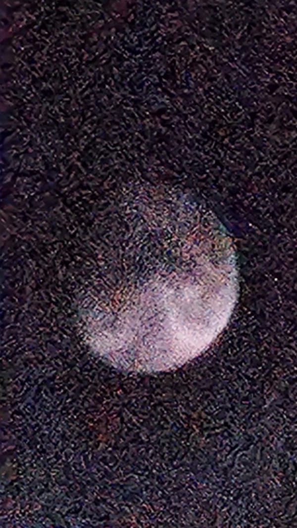Sofia residents document cloudy moonlit sky Tuesday evening
