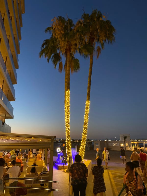 Resort evening comes alive at dusk in Vila-seca