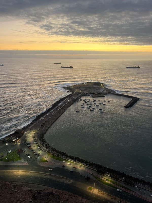 Dusk aerial view captured of Arica pier and harbor