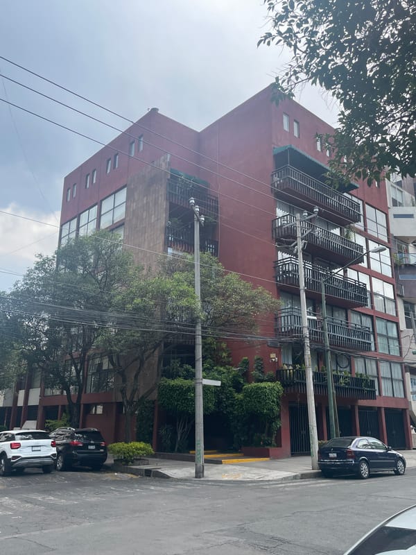 Residential building documented in Mexico City street scene
