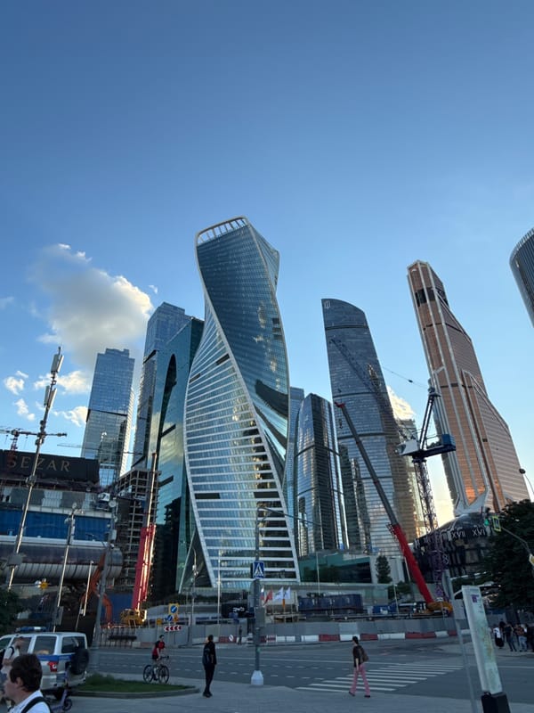 Moscow City skyline along the river on a clear summer day