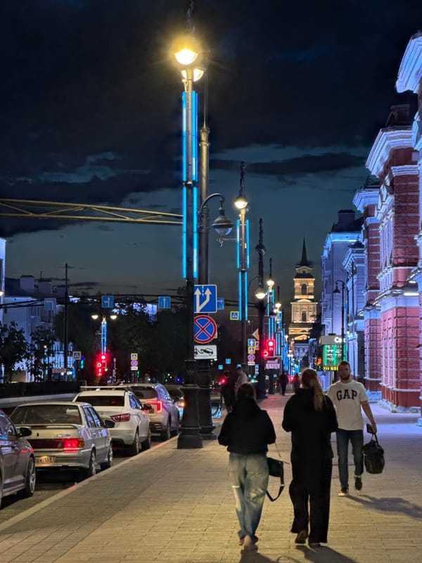 Illuminated street scene captured at night in Perm, Russia
