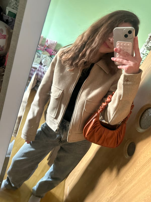 Woman takes mirror selfie in Ruse, Bulgaria