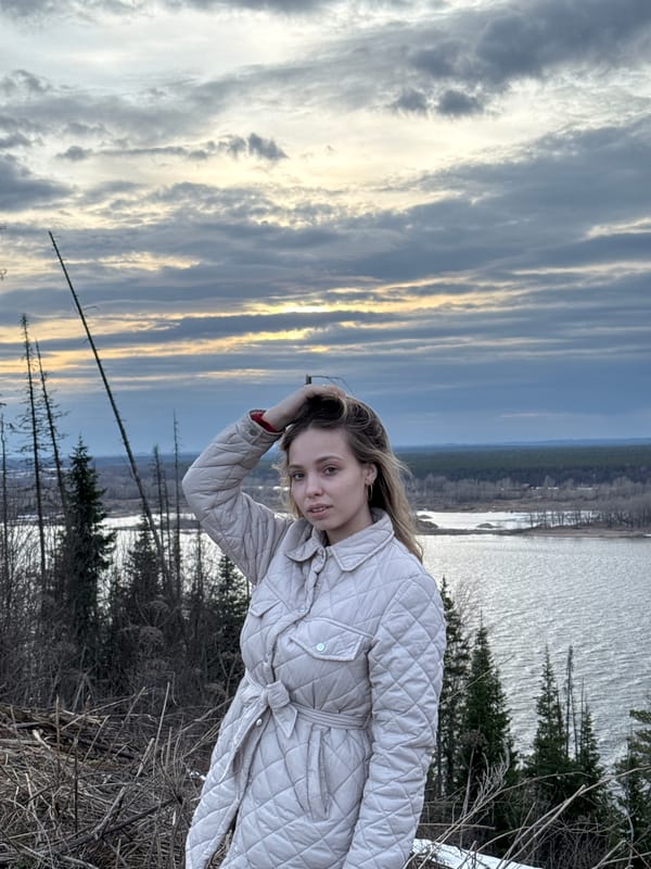 Couple photographs selfies near Kama River in Chaykovsky, Russia
