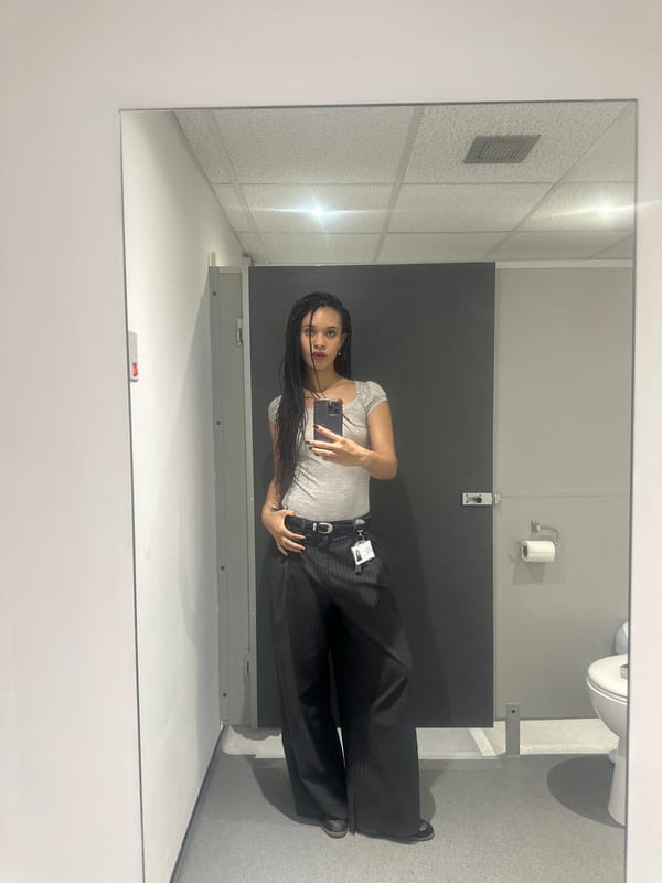 Person Takes Bathroom Selfie in London