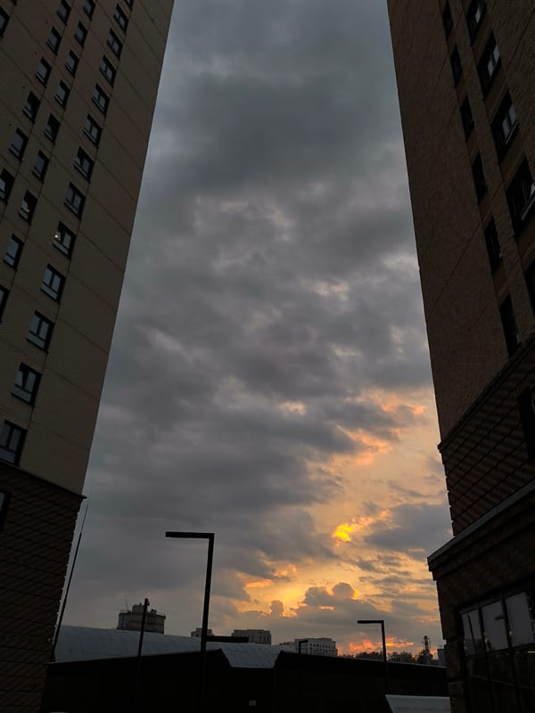 Storm clouds and golden light over Novosibirsk's urban skyline