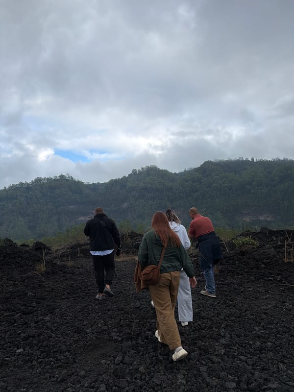 Exploring Kintamani's volcanic lava fields on a cloudy morning