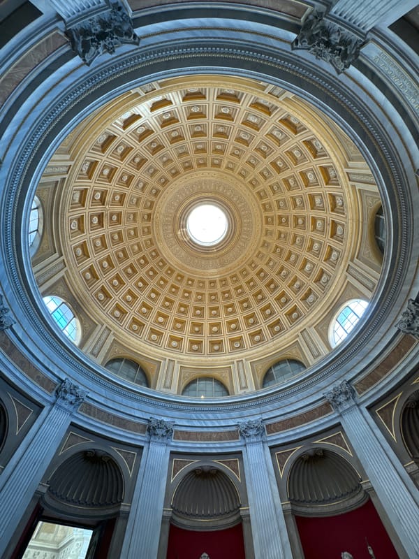 Visitors capture Rome building's coffered dome and bronze statue