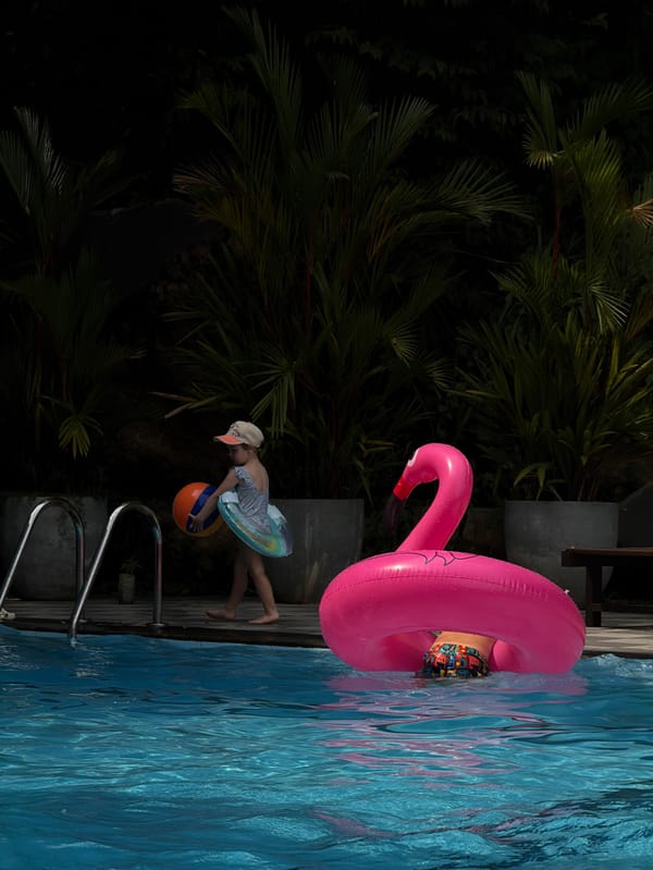 Family enjoys morning pool time in Unawatuna, Sri Lanka