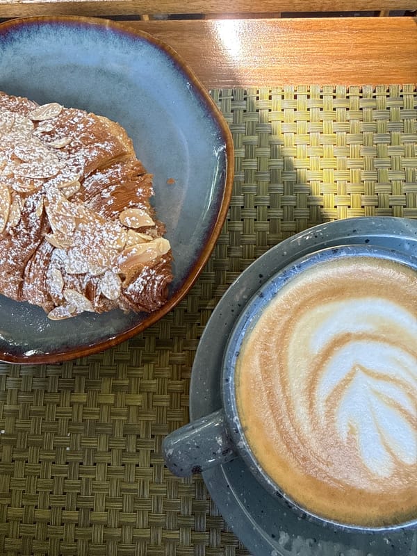 Lazy café morning with coffee and croissants in Ko Samui